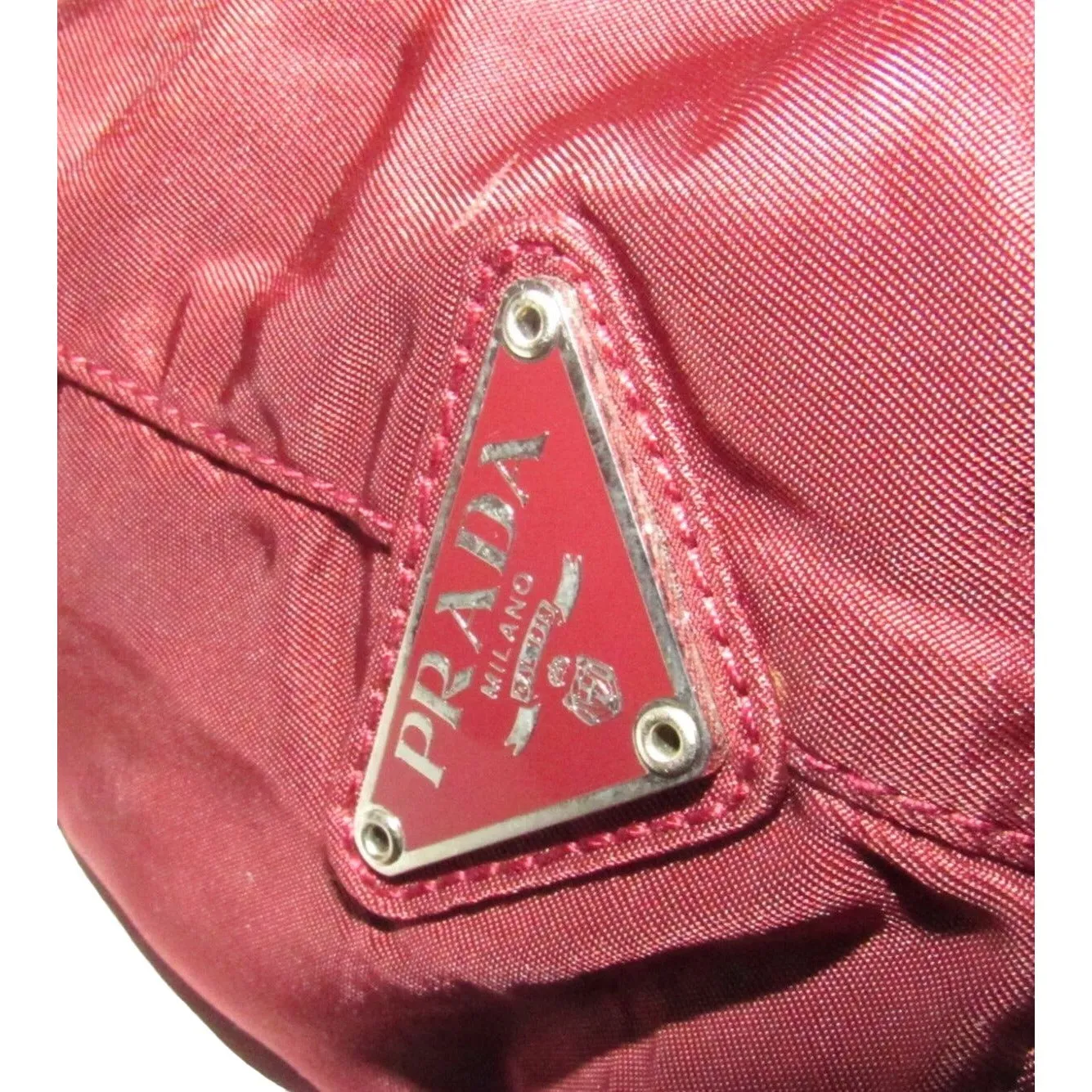 1990s Prada, dark red nylon & patent leather, satchel or tote bag with two handles, multiple compartments & pockets, & chrome hardware
