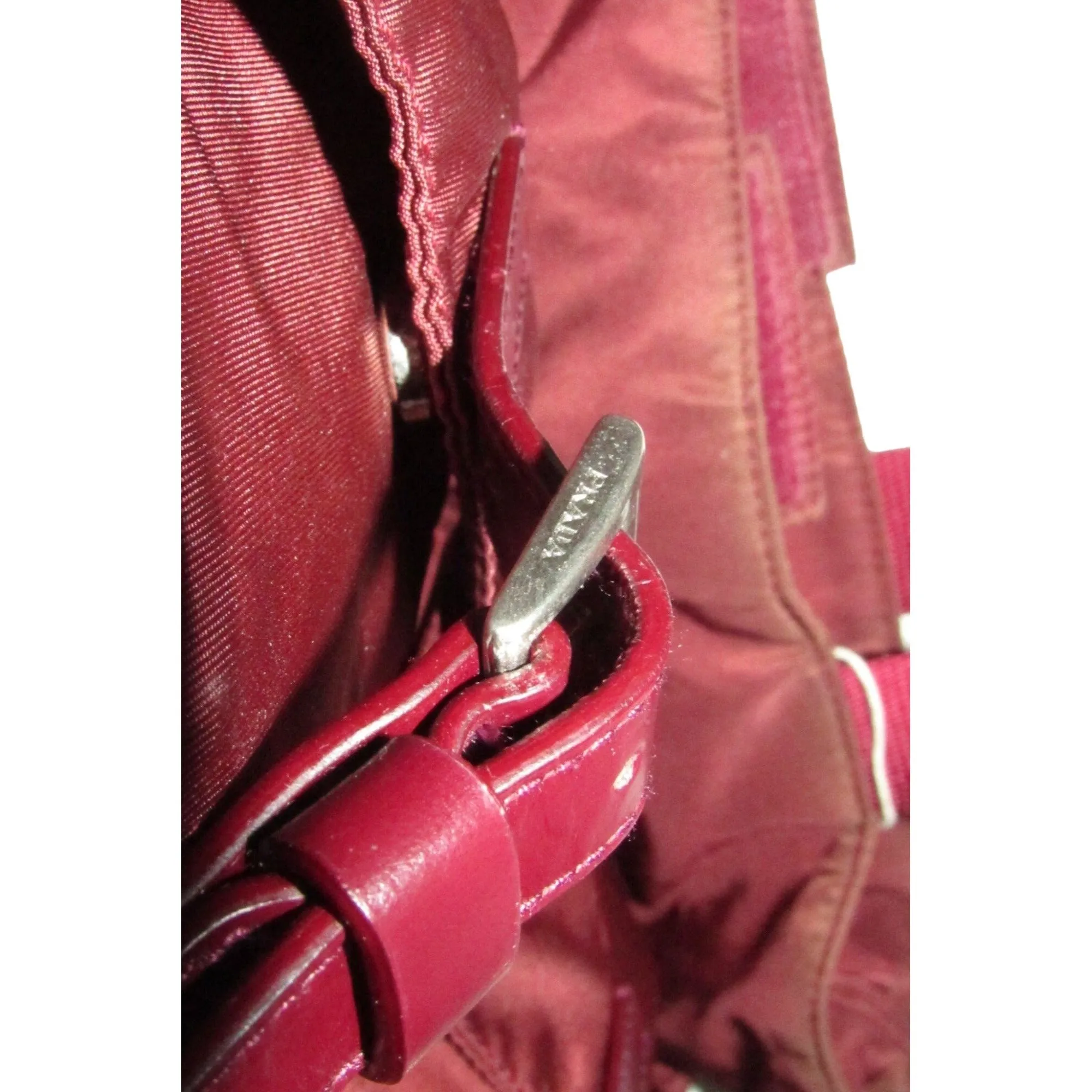 1990s Prada, dark red nylon & patent leather, satchel or tote bag with two handles, multiple compartments & pockets, & chrome hardware