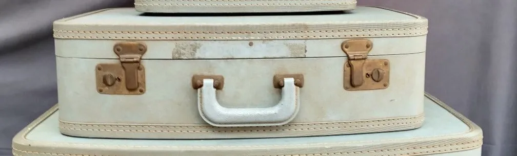 MEDIUM BLUE SUITCASE