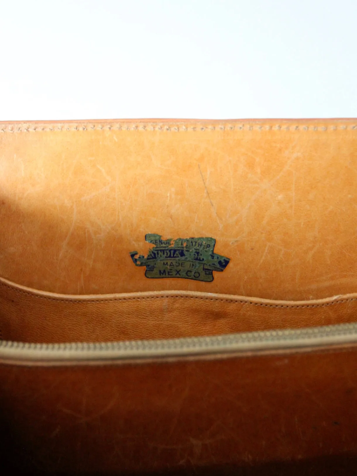 vintage tooled leather satchel